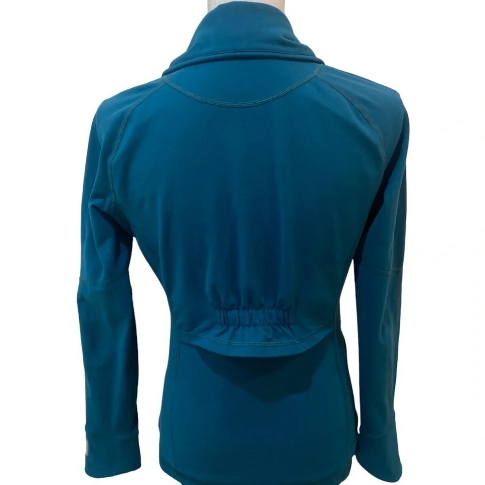 Zella zip up teal ruched athletic jacket with zip up pockets & ruffle back small